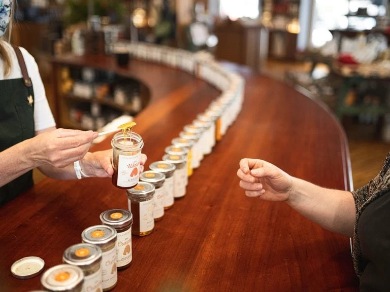 Honey sampling at a Beechworth Honey tasting counter